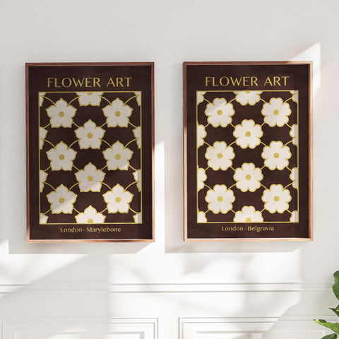 Two framed floral art pieces with 'Flower Art' text on a white wall.